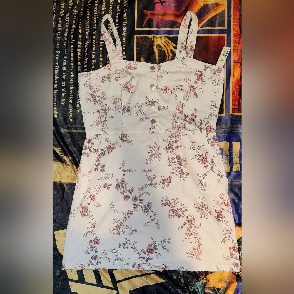 SOLD - NWT - No Boundaries white floral pinafore dress with pockets.